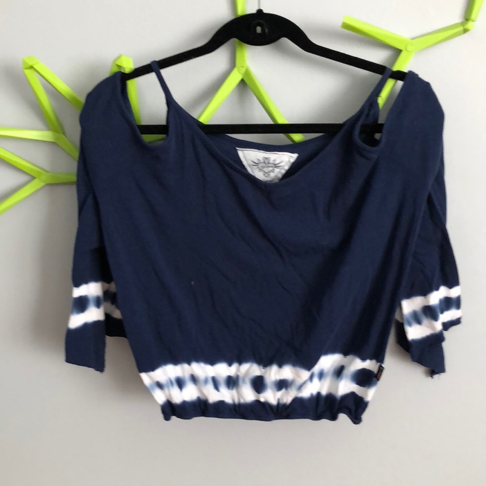 T2love girl’s shirt size 10. Cotton with arm cut outs and tied dyed at bottom.
